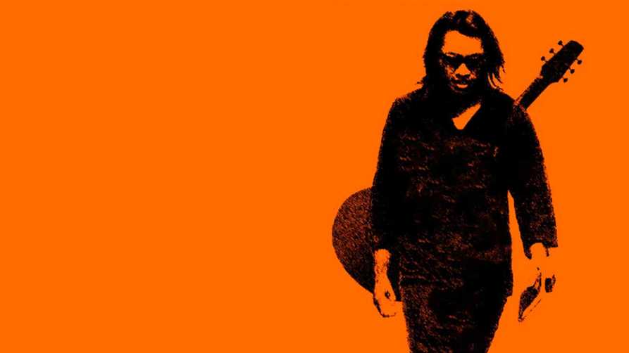 Sixto Rodriguez orange